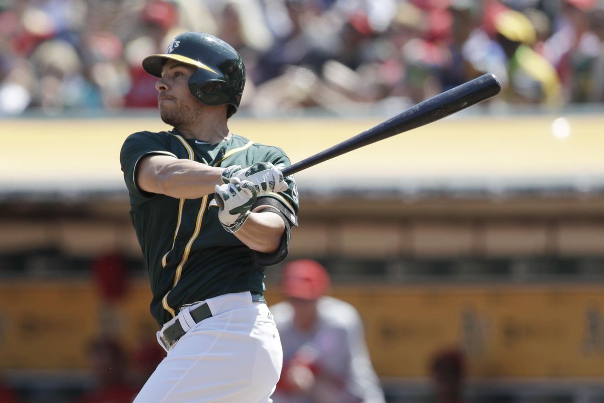 Oakland Athletics’ Danny Valencia watches his two-run home run against the Los Angeles Angels during the first inning of a baseball game Monday, Sept. 5, 2016, in Oakland, Calif. (Marcio Jose Sanchez / Associated Press)