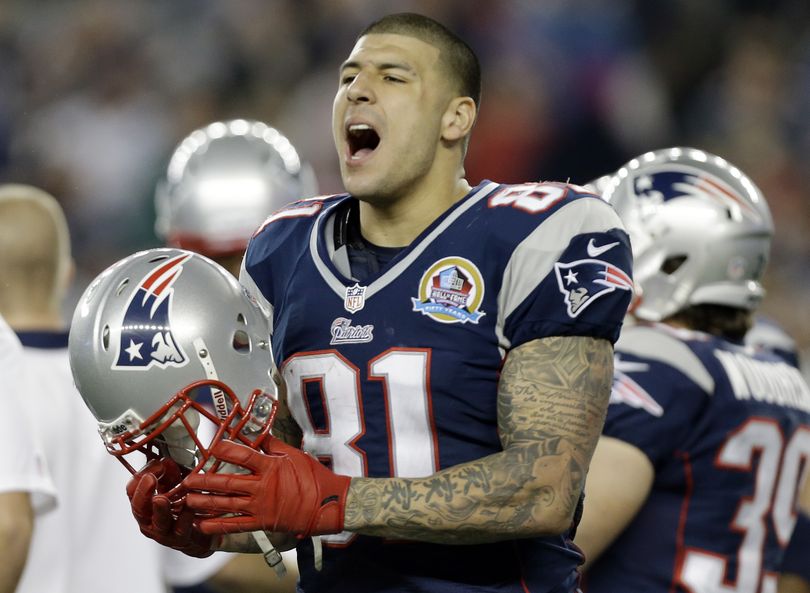 Aaron Hernandez, who was cut by the Patriots after being charged with murder, is one of 37 NFL players to be arrested this year. (Associated Press)