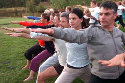 
Participants take part in a yoga retreat at the Feathered Pipe center near Helena earlier this month.Associated Press
 (Associated Press / The Spokesman-Review)