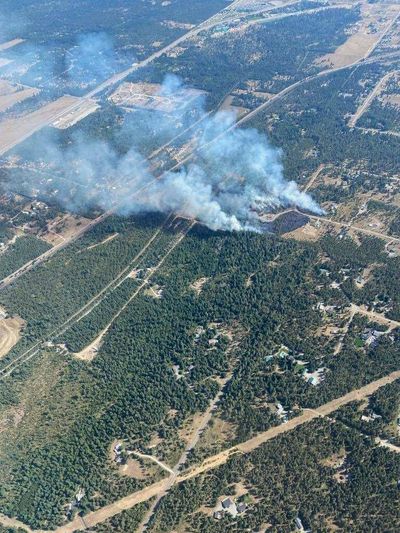 Smoke is seen from the Sarah Loop Fire on Tuesday near Athol.  (Courtesy of Idaho Department of Lands)