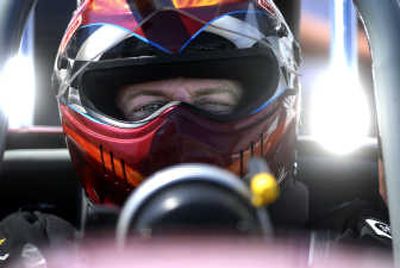 
Wes Garvin, of the Tri-Cities, prepares to race his Nasty Boys 23T drag car on Saturday at Spokane Raceway Park in the Summer Nitro Extravaganza. 
 (Photos by Jed Conklin / The Spokesman-Review)