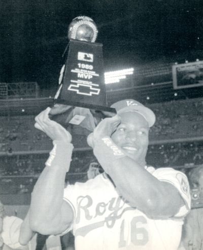 Bo Jackson holds his MVP trophy from the 1989 All-Star game. (Associated Press)