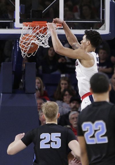 Gonzaga forward Brandon Clarke dunks during the second half against San Diego. (Young Kwak / Associated Press)