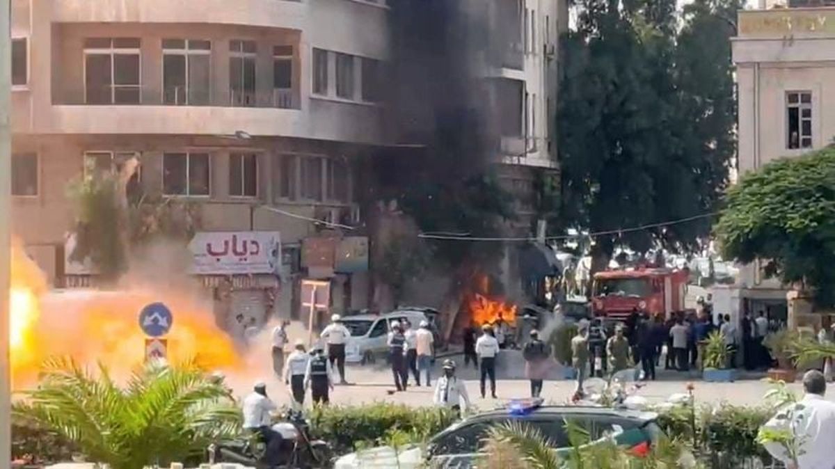 Smoke and fire rise at the site where explosive devices blew up near a hotel where French President Emmanuel Macron was meant to be staying, in Damascus, Syria, in this screengrab obtained from a video, July 7, 2026. (Yamam Al Shaar/Reuters)