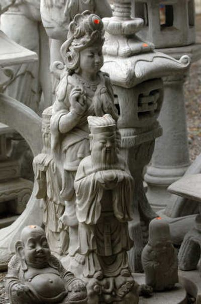 
Among the inventory of Backyard Creations are Asian and Buddhist inspired figurines. 