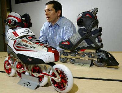 
Jeremy Stonier, vice president and general manager of Rollerblade Inc., appears during an interview between the 2006 model Lightning TF, left, and the Aero 90, two of the company's more than 30 in-line skating products. 
 (Associated Press / The Spokesman-Review)