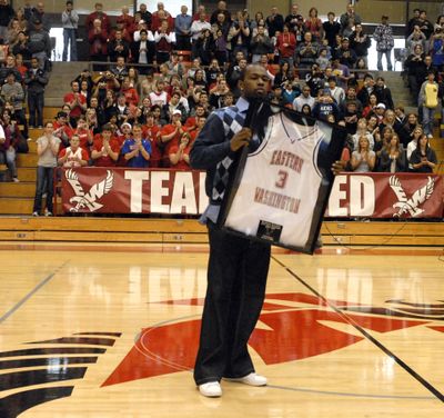 ORG XMIT: WASPO103 Former Eastern Washington University All-American  basketball player and current Detroit Piston guard Rodney Stuckey shows off his retired #3 jersey at a ceremony honoring him during half-time of the Eastern Washington Weber St. NCAA college basketball game in Cheney, Wa., Sunday, Jan. 11, 2009. Weber St. beat the Eagles, 77-69  (AP Photo/The Spokesman Review, J. Bart Rayniak) ** NO SALES; COEUR D'ALENE OUT; MAGS OUT; TELEVISION OUT ** (J. Rayniak / The Spokesman-Review)