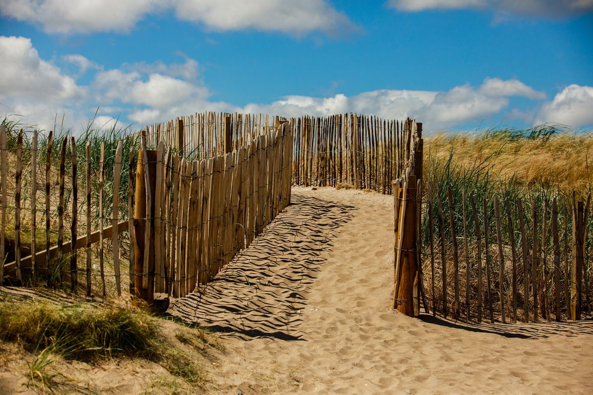 West Sands Beach at St. Andrews, Scotland, July 12, 2022, where experts have warned coastal erosion has damaged the dunes. The Old Course, site of this year