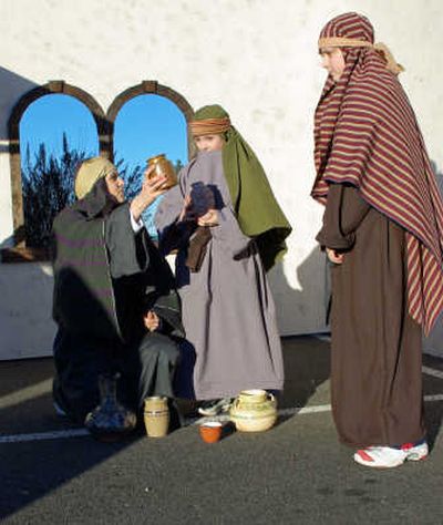 
Townspeople in the living nativity at Crossover Church. Photo courtesy of Cameron Glass CG Photography
 (Photo courtesy of Cameron Glass CG Photography / The Spokesman-Review)