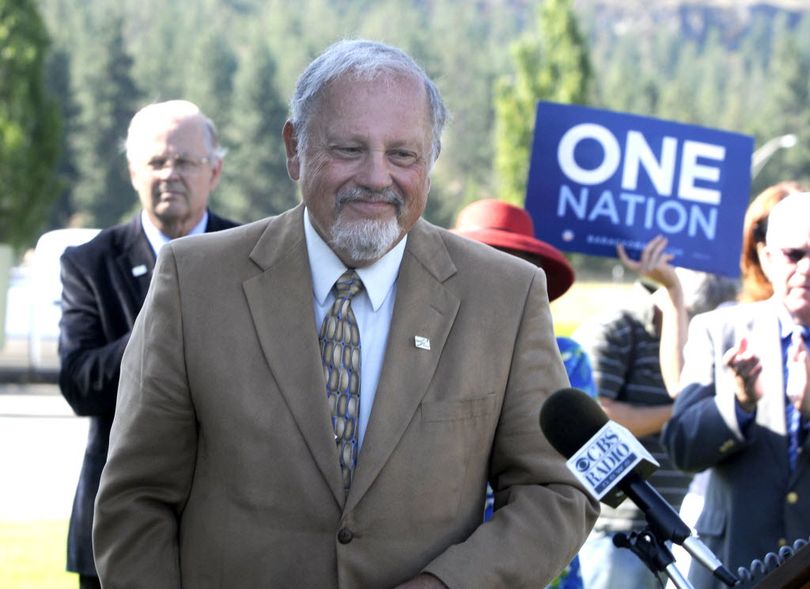 Spokane Valley Mayor Rich Munson approaches the podium to speak at a press conference at the state line Friday, Aug. 21, 2009. A press conference was called by government and law enforcement officials and human rights organizers in Washington and Idaho to speak to the recent distribution of racist flyers. (Jesse Tinsley)