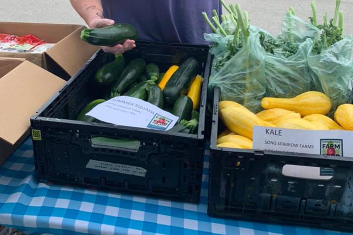 Out Place Food Bank gives away vegetables to those seeking fresh produce in the West Central Neighborhood. (Our Place Community Ministries / Courtesy photo)