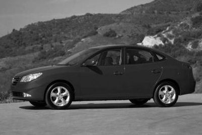 Under the hood sits a 138-horse 2.0-liter four-cylinder engine hooked to a four-speed automatic transmission. With 136-pound-feet of torque, you won't win any drag races, but you're sure to travel farther on a tank of fuel. 
 (AP / The Spokesman-Review)