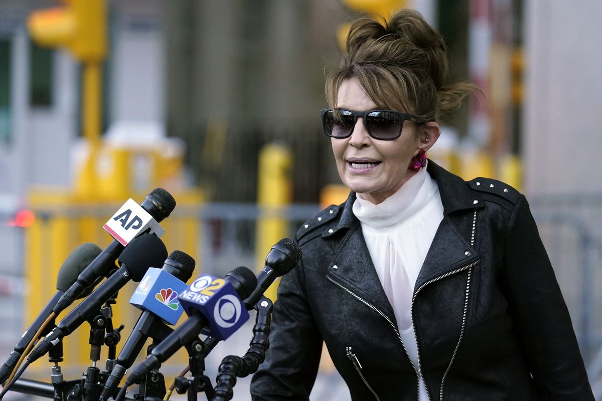 FILE - Former Alaska Gov. Sarah Palin speaks briefly to reporters as she leaves a courthouse in New York, Feb. 14, 2022. Palin is one of 48 candidates for Alaska's lone U.S. House seat, which was held for decades by Republican Rep. Don Young, who died last month. Palin says she's serious about the run though some critics have questioned her motivations.   (Seth Wenig)