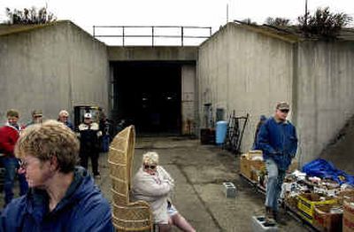 
A crowd gathers outside the Cold War missle silo near Davenport that belonged to convicted killer Ralph H. Benson to bid on items up for auction. 
 (Brian Plonka photos/ / The Spokesman-Review)