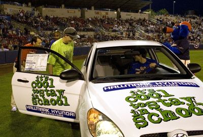 Tim Nikkola of West Valley High School gets into the Hyundai Accent he won last Saturday at the Spokane Indians game for perfect attendance at school.Photo courtesy of Sean Lumsden (Photo courtesy of Sean Lumsden / The Spokesman-Review)