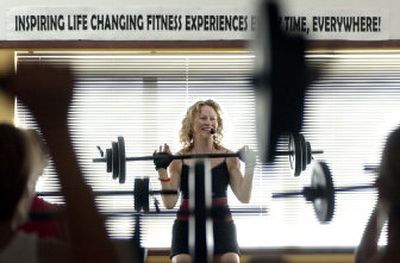 
Millie Eylar is the fitness director at Post Falls World Gym. The gym is hosting Pump in the Park next Thursday at Q'emiln Park Grand Pavilion.
 (File photo / The Spokesman-Review)
