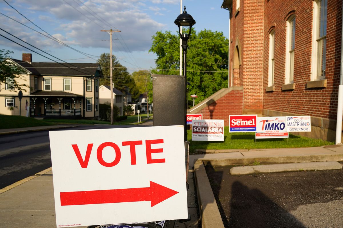 Signs point the way for voters to cast their ballots at the polling location for the Pennsylvania primary election, Tuesday, May 17, 2022, in Harmony, Pa.,  (Keith Srakocic)