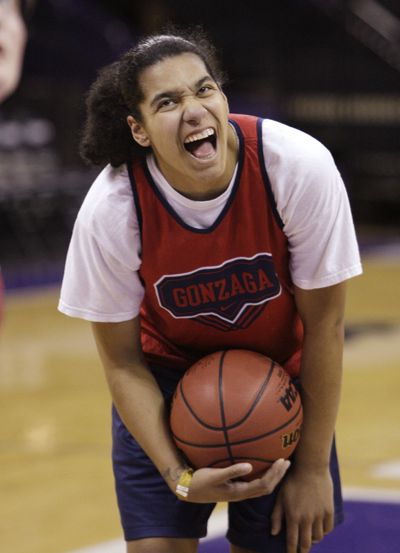 Gonzaga’s Vivian Frieson shares a laugh with teammates on eve of NCAA opener.  (Associated Press / The Spokesman-Review)