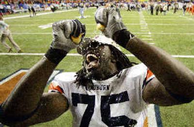 
 Stanley McClover squeezes an orange but Auburn could get squeezed out of BCS title game.
 (Associated Press / The Spokesman-Review)