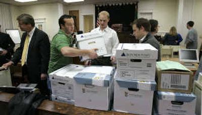 
Workers get ready for the trial over the fate of the 2004 Washington gubernatorial election Monday in Wenatchee. 
 (Elaine Thompson/Associated Press / The Spokesman-Review)