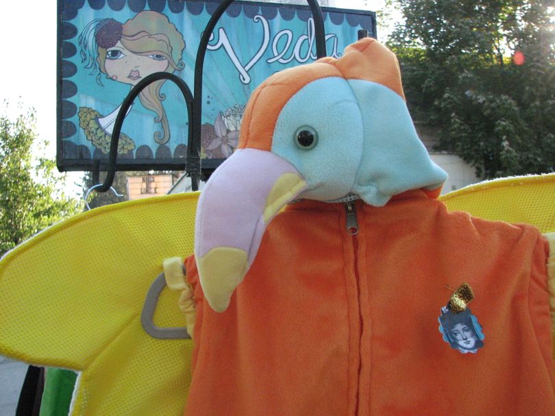 A parrot outfit hangs outside Veda Lux on South Perry Street on October 21. (Pia Hallenberg)