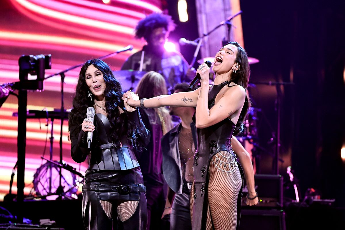 CLEVELAND, OHIO - OCTOBER 19: Cher and Dua Lipa perform onstage during the 2024 Rock & Roll Hall Of Fame Induction Ceremony streaming on Disney+ at Rocket Mortgage Fieldhouse on October 19, 2024 in Cleveland, Ohio. (Photo by Theo Wargo/Getty Images for The Rock and Roll Hall of Fame)  (Theo Wargo)