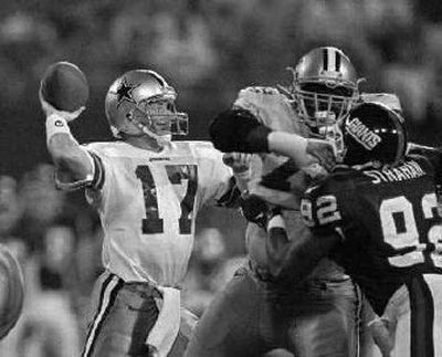 
Jason Garrett (17) joined the coaching staff of his former team.
 (Associated Press / The Spokesman-Review)