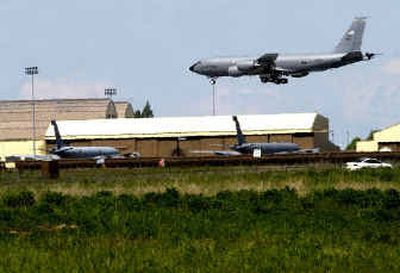 
A KC 135 touches down at Fairchild Air Force Base on Thursday afternoon on the eve of a government announcement to close or downsize military bases around the country. 
 (Brian Plonka / The Spokesman-Review)