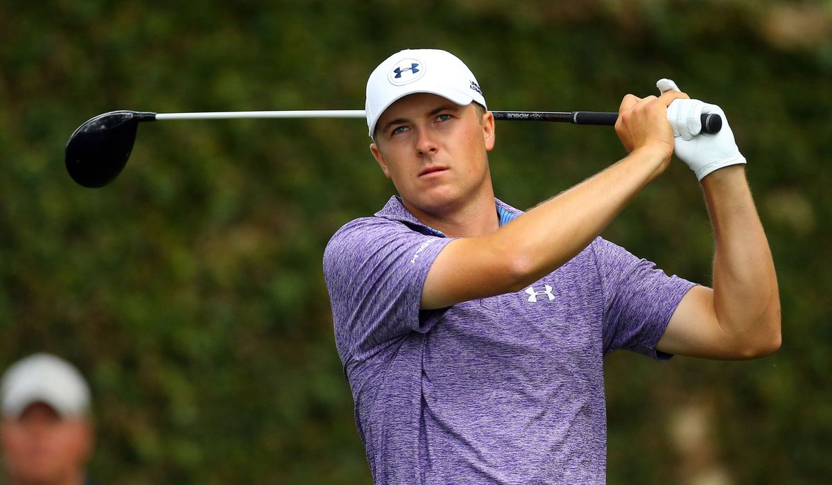 Jordan Spieth hits from the second tee during the second round of the Masters at Augusta, finishing the day with a five-shot lead over Charley Hoffman.