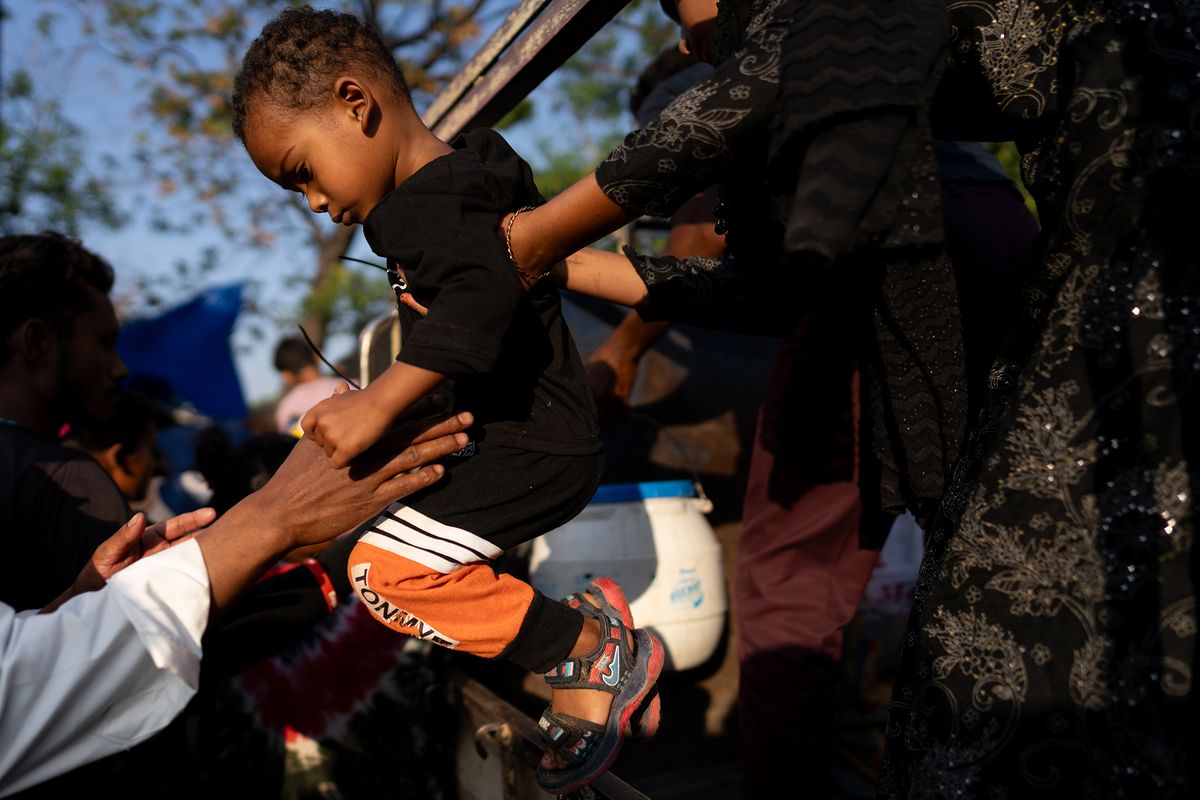 JAMMU, INDIA – MAY 10: A young child is carried as people arrive at the ‘Jammu-Tawi’ railway station on May 10, 2025 in Jammu, India.Tensions between India and Pakistan have sharply escalated following India’s targeted strikes on alleged “terrorist infrastructure” inside Pakistan, which were carried out in retaliation for a deadly attack in Indian-administered Kashmir last month. Both sides have since exchanged drone and missile attacks along the border, resulting in dozens of fatalities and widespread disruption, with each nation vowing further action while international mediators urge de-escalation. (Photo by Anindito Mukherjee/Getty Images)  (Anindito Mukherjee)