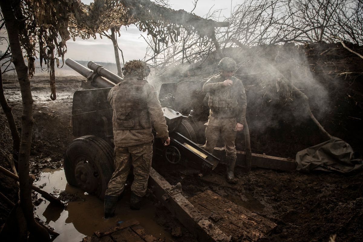 Ukrainian solders fire an M101A1 105mm howitzer at Russian targets on Feb. 14 near Avdiivka, Ukraine.  (TYLER HICKS)