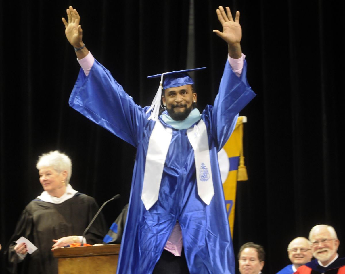 Former Gonzaga University men’s basketball standout Ronny Turiaf acknowledges the audience and fellow members of the 2010 graduating class during Sunday’s commencement at the Spokane Veterans Memorial Arena. (J. BART RAYNIAK)