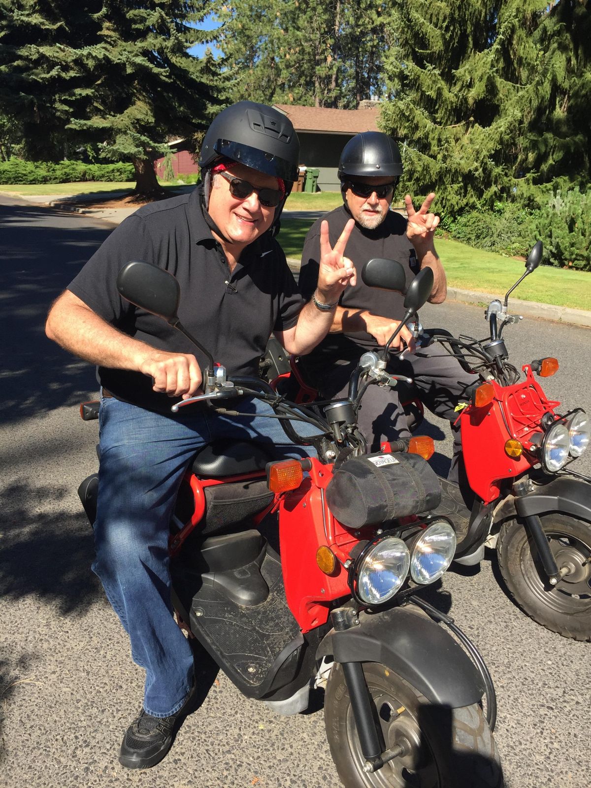 Doug Clark, left, and Scott Cooper as they saddle up for an extended trip on their Ruckus motor scooters, on July 25, 2016. (Doug Clark)