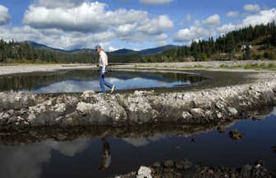 
Bob Flagor of the Kootenai-Shoshone Soil and Water Conservation District checked out the progress of the Hauser Wetlands Project near Hauser Lake on Monday. The wetland restoration project is on land owned by Ray Laboure of Hauser Lake. 
 (Kathy Plonka / The Spokesman-Review)