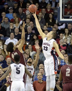 Gonzaga’s Kyle Wiltjer gets a piece of a shot by DeAndre Bembry of Saint Joseph’s during the first half. (Jesse Tinsley)