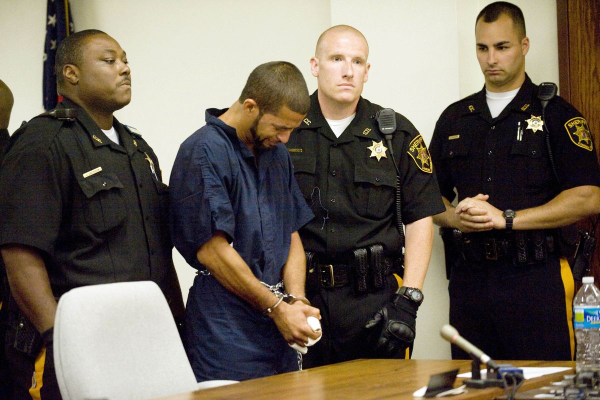 Osvaldo "Popeye" Rivera, of Camden, N.J, accused of killing a 6-year-old boy while high on PCP-laced marijuana, sobs during his arraignment at  Camden County Superior Court in Camden, N.J. on Tuesday, Sept. 4, 2012. Prosecutors say Rivera slashed the throat of the boy, who was trying to save his sister as she was being assaulted on the floor during a middle-of-the-night attack on Sunday. (Chris Lachall / Pool Camden Courier-post)