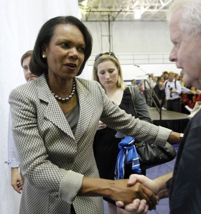 Former Secretary of State Condoleezza Rice greets Romney supporters as she leaves  Broward College after a 