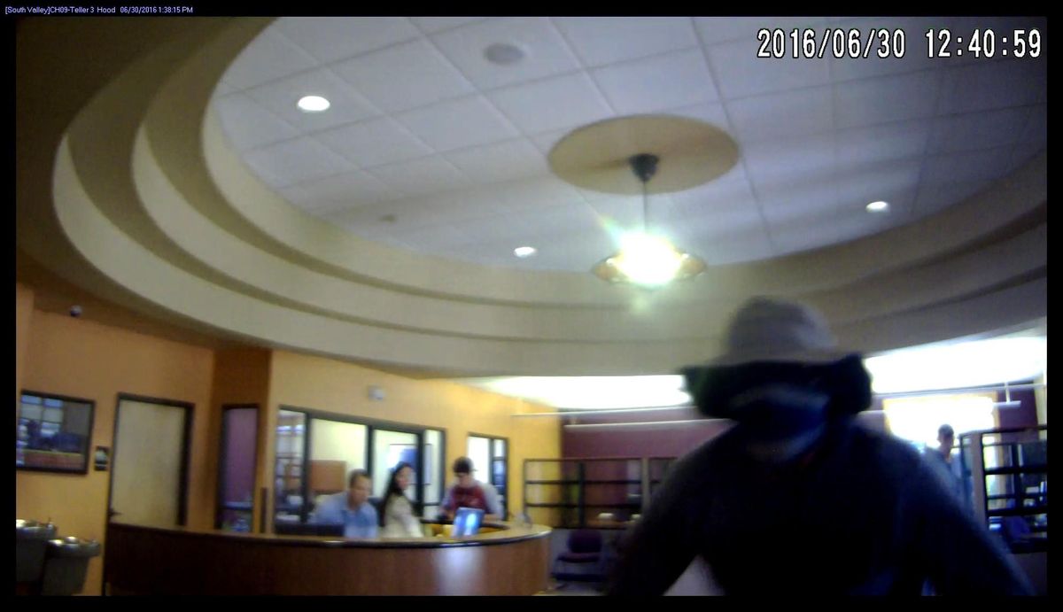 Security camera image of the person who robbed the Spokane Valley branch of STCU on Thursday, June 30. (STCU / Courtesy)