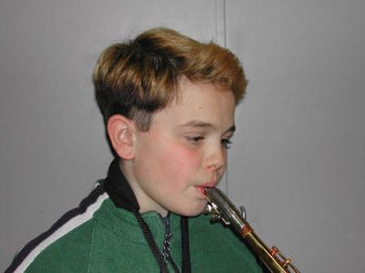 
Connor Henry, a sixth-grader at Centennial Middle School, plays the alto saxophone.
 (Photo by Jennifer Larue / The Spokesman-Review)