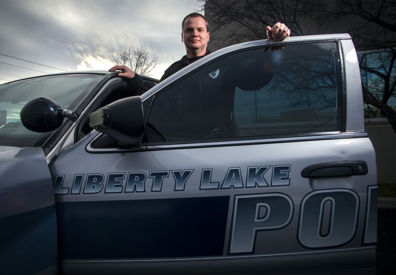 After many years of having a nine-man police department, Liberty Lake has hired a new officer to bring the city’s ranks to 10. Officer Jeff Jones is experiencing a bit of culture shock. He went from being a deputy in rural Pend Oreille County, often driving 50 miles or more to respond to a call, to an urban environment. He’s learning the lay of the land and getting used to a new style of policing. (Colin Mulvany)