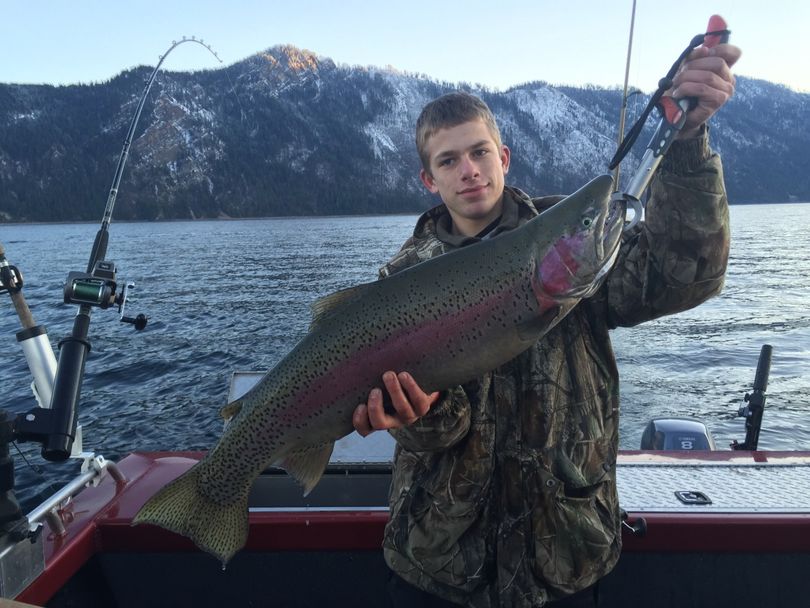 Kameron Roslak holds a 13-pound rainbow trout caught in Lake Pend Oreille.   (Idaho Department of Fish and Game)
