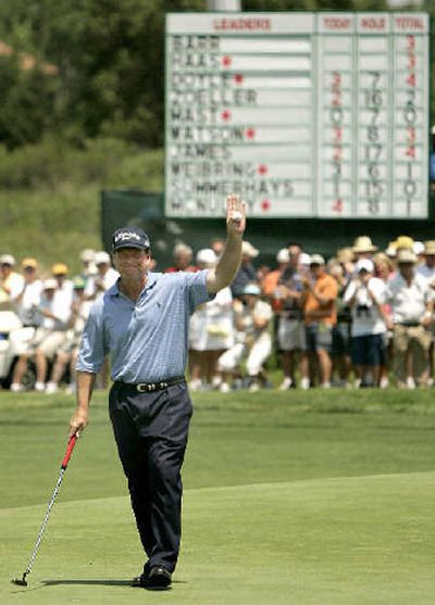 
Tom Watson waves to the gallery after completing the second round at Prairie Dunes. 
 (Associated Press / The Spokesman-Review)
