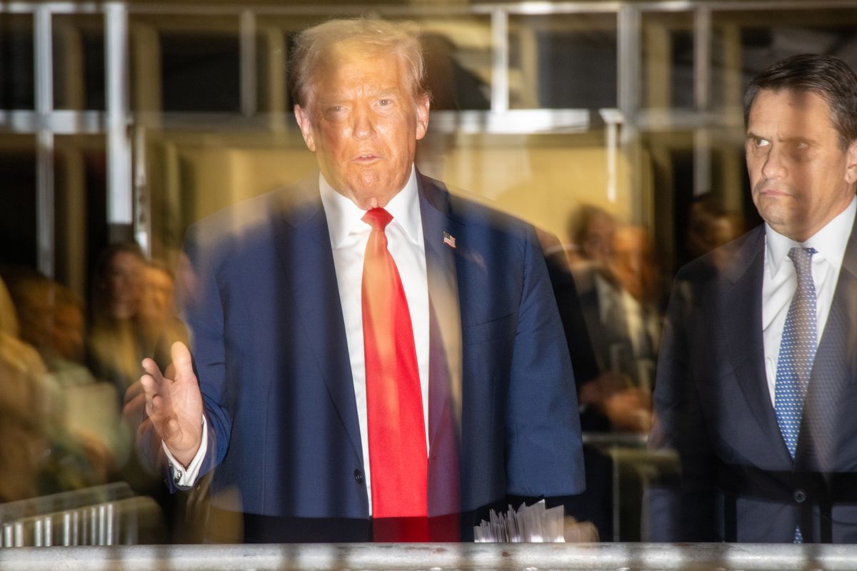 Donald Trump speaks in the hallway outside of the courtroom at the end of Tuesday’s proceedings in Manhattan. MUST CREDIT: John Taggart for The Washington Post  (John Taggart/for The Washington Post)