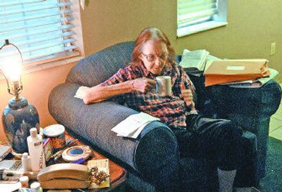 
Irene Parker sits in her Airway Heights apartment Tuesday. When she was evicted from her Spokane  home in 2003, most of her belongings were left on the curb. Proposed legislation would protect landlords who do that from liability. 
 (Dan Pelle / The Spokesman-Review)