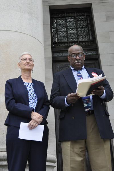 OLYMPIA -- Mary Martin, gubernatorial candidate for the Socialist Workers Party, and Osborne Hart, its vice presidential nominee, say their presidential slate will be on Washington's general election ballot in November during a press conference on the Capitol steps on July 5, 2016.  (Jim Camden/The Spokesman-Review)