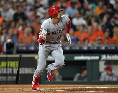 In this Sept. 21, 2018,  photo, Los Angeles Angels' Shohei Ohtani lines out against the Houston Astros during the fourth inning of a baseball game in Houston. Ohtani has been medically cleared to resume full strength training on his right arm following Tommy John surgery, although he will not be ready to hit for the Angels by opening day. (David J. Phillip / Associated Press)