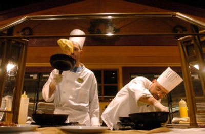 
Buffet chefs AnD'rue Vought, left, and Pete Pesseti serve made-to-order omelets to customers at the High Mountain Buffet in the Coeur d'Alene Casino near Worley, Idaho. Tribal casinos are a growth industry in Idaho and Washington, employing more than 2,000 people in the Inland Northwest. 
 (Photos by Jesse Tinsley / The Spokesman-Review)