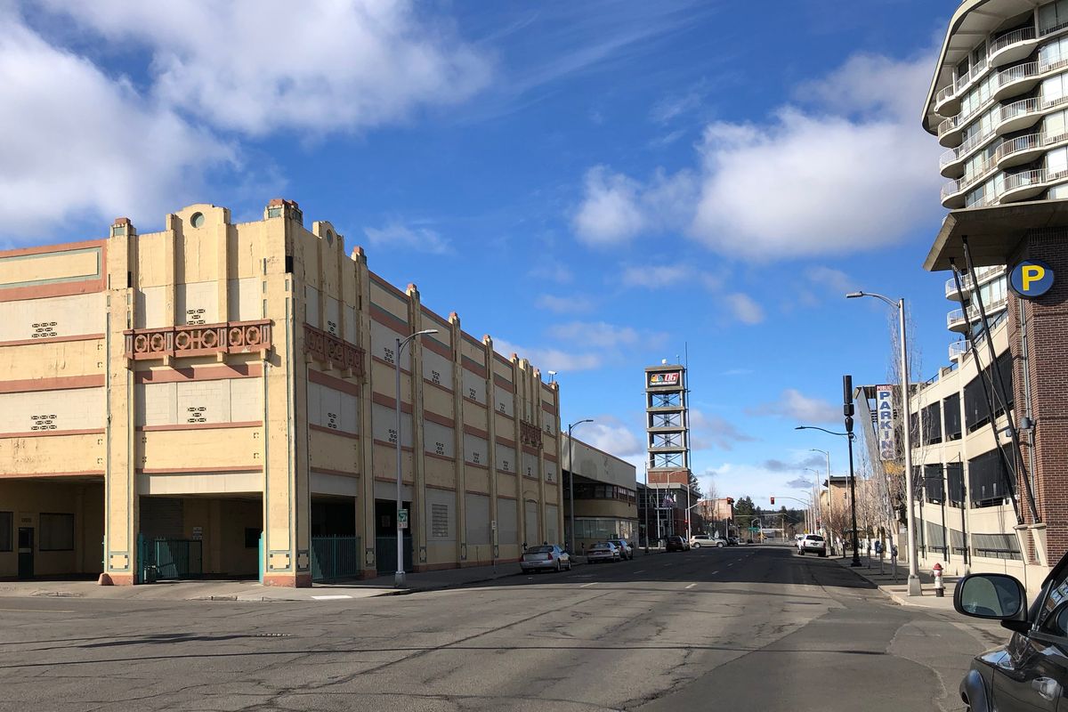 Present day: The three-story parking garage housed several auto and auto parts businesses since the early 1900s. Attached beyond that is the former Union Bus Depot that served the city’s regional and interstate bus riders from 1947 until 1994, when the terminal was moved to the Northern Pacific train station at Riverside and Bernard. The Cowles Real Estate Company, part of the company that owns The Spokesman-Review, purchased the old bus station from the Greyhound company and has used it for parking and storage ever since.  (Jesse Tinsley/THE SPOKESMAN-REVIEW)