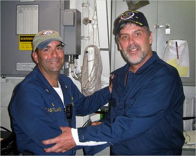 U.S. Navy via Reuters: Richard Phillips, captain of the U.S.-flagged cargo ship Maersk Alabama, right, after his rescue, with Cmdr. Frank Castellano, the commanding officer of USS Bainbridge. (The Spokesman-Review)