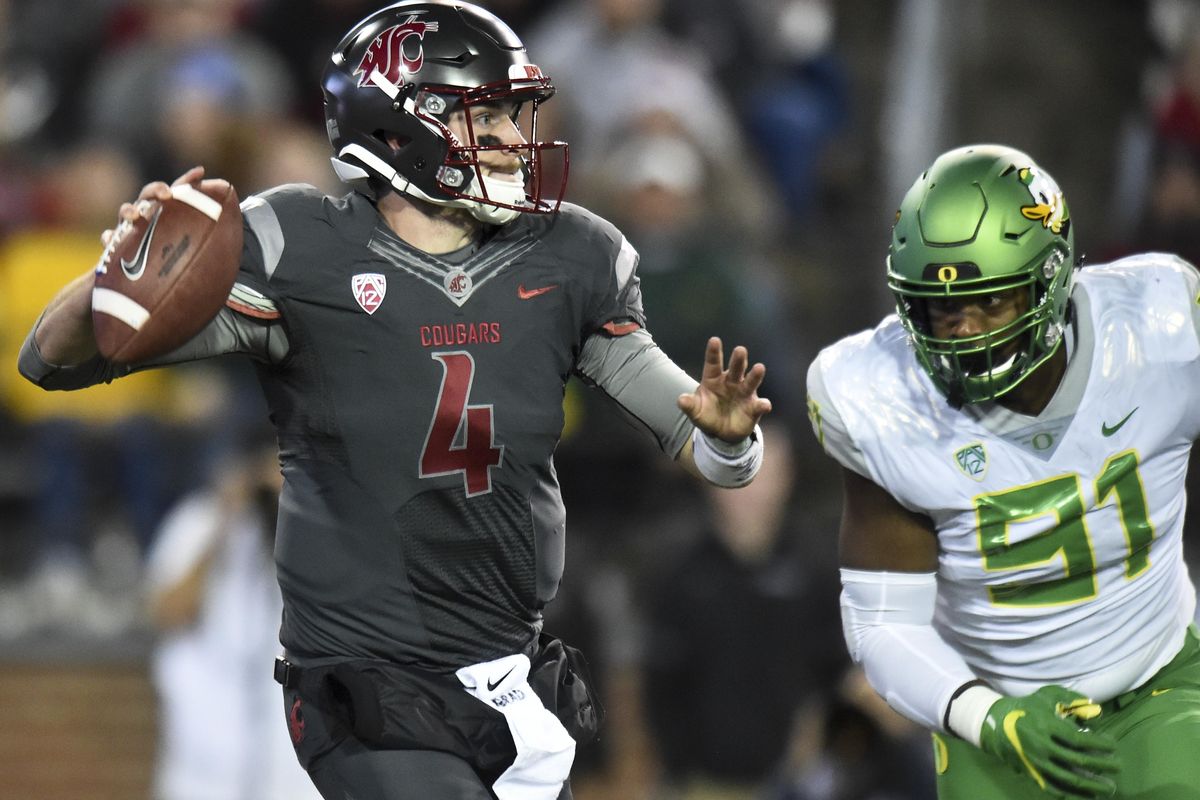 Washington State Cougars quarterback Luke Falk (4) will not have to face Stanford’s starting cornerbacks on Saturday. (Tyler Tjomsland / The Spokesman-Review)